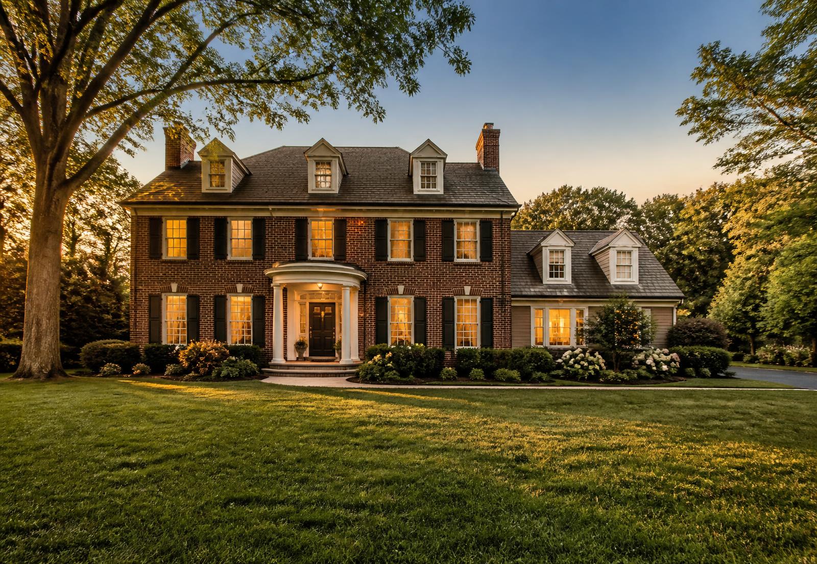 Brick colonial home in Maryland at golden hour